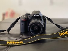 Nikon D3400 DSLR Camera With 18-55mm Lens black gently used. Two batteries