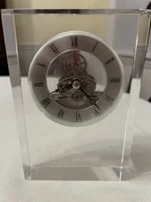 Glass skeleton face clock works great