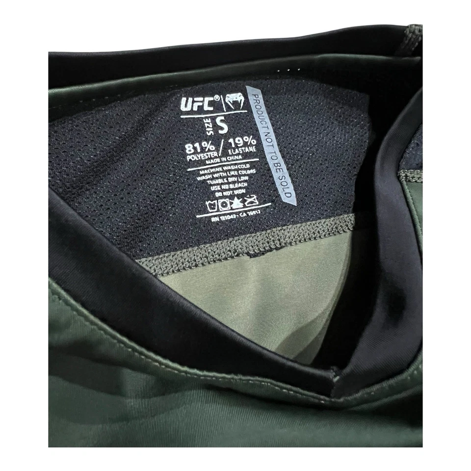 UFC Venum Auténtica Muestra/Promo Semana de Lucha Mujer’s Rendimiento Manga Larga Talla S Foto 3 de 4