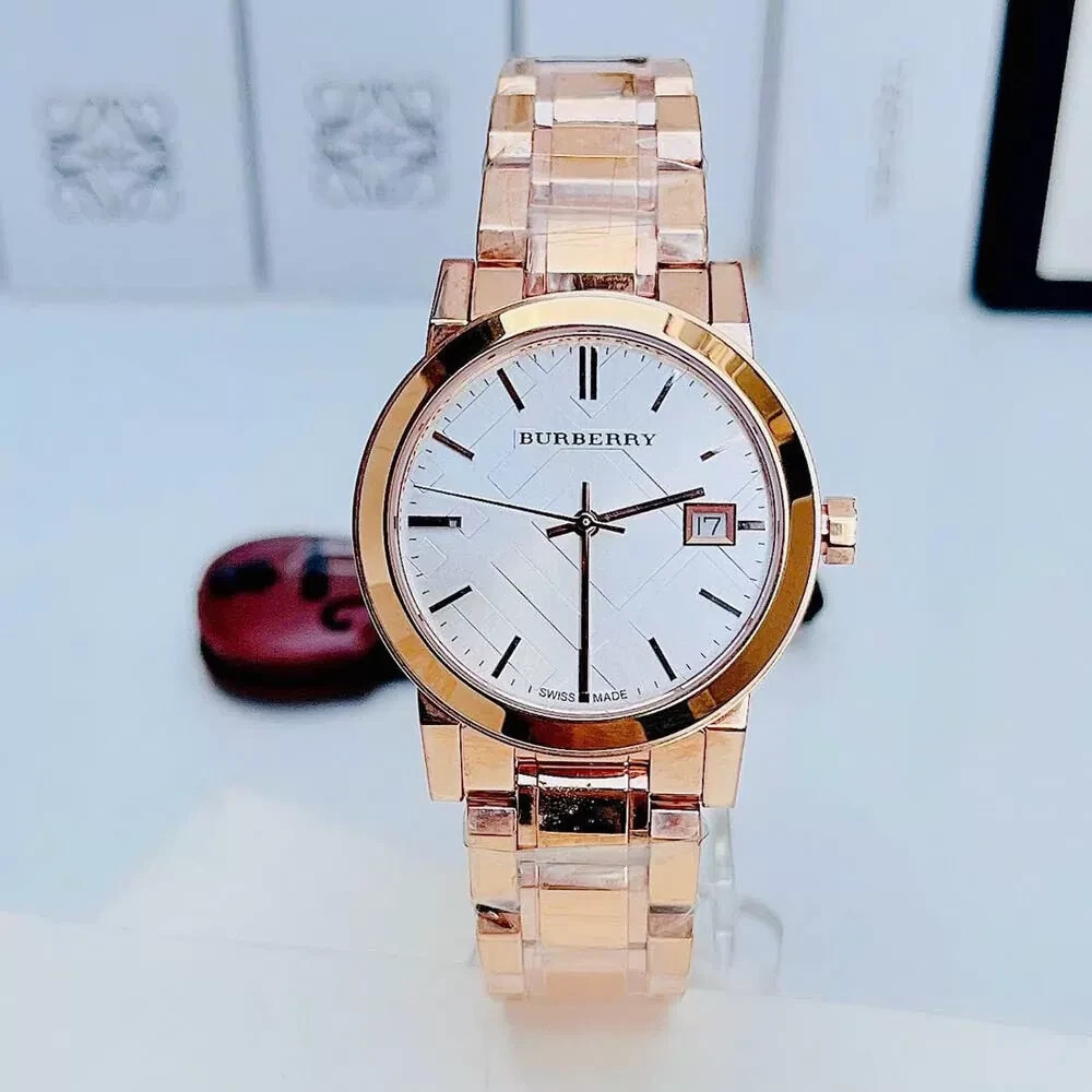Montre Burberry femme de fabrication suisse en plaqué or rose avec date