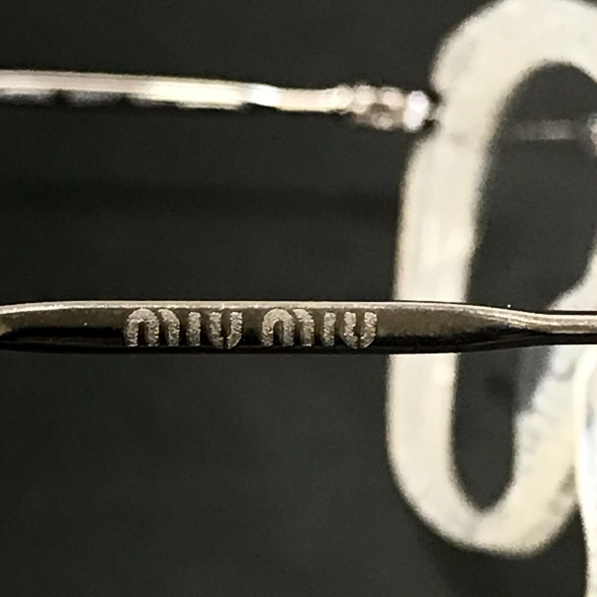 Miu Miu Eyeglasses Frames VMU04L KAR-1O1 Milky White Silver Miu Miu Eyeglasses Frames VMU04L KAR-1O1 Milky White Silver