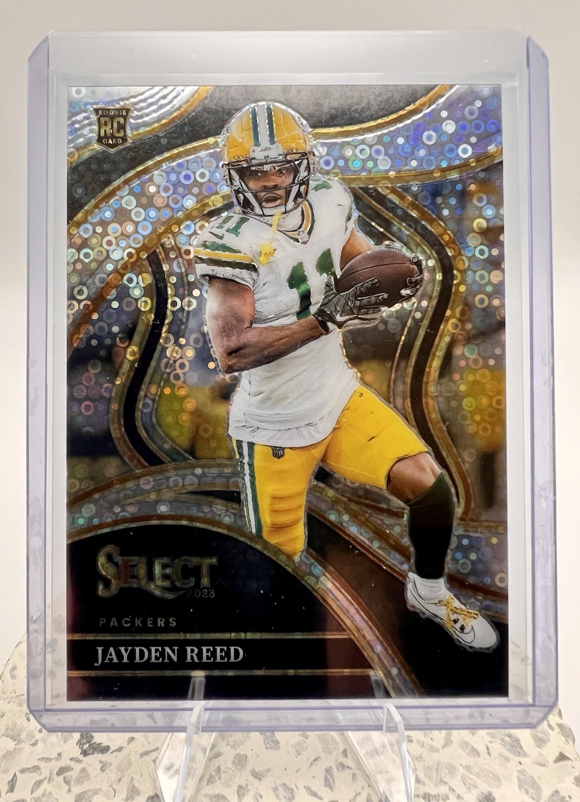 2023 Panini Select - Club Level Jayden Reed #258 Disco Prizm (RC)