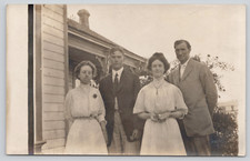 Postcard RPPC Two Young Couples in Suit Dresses Outside House Boutonniere