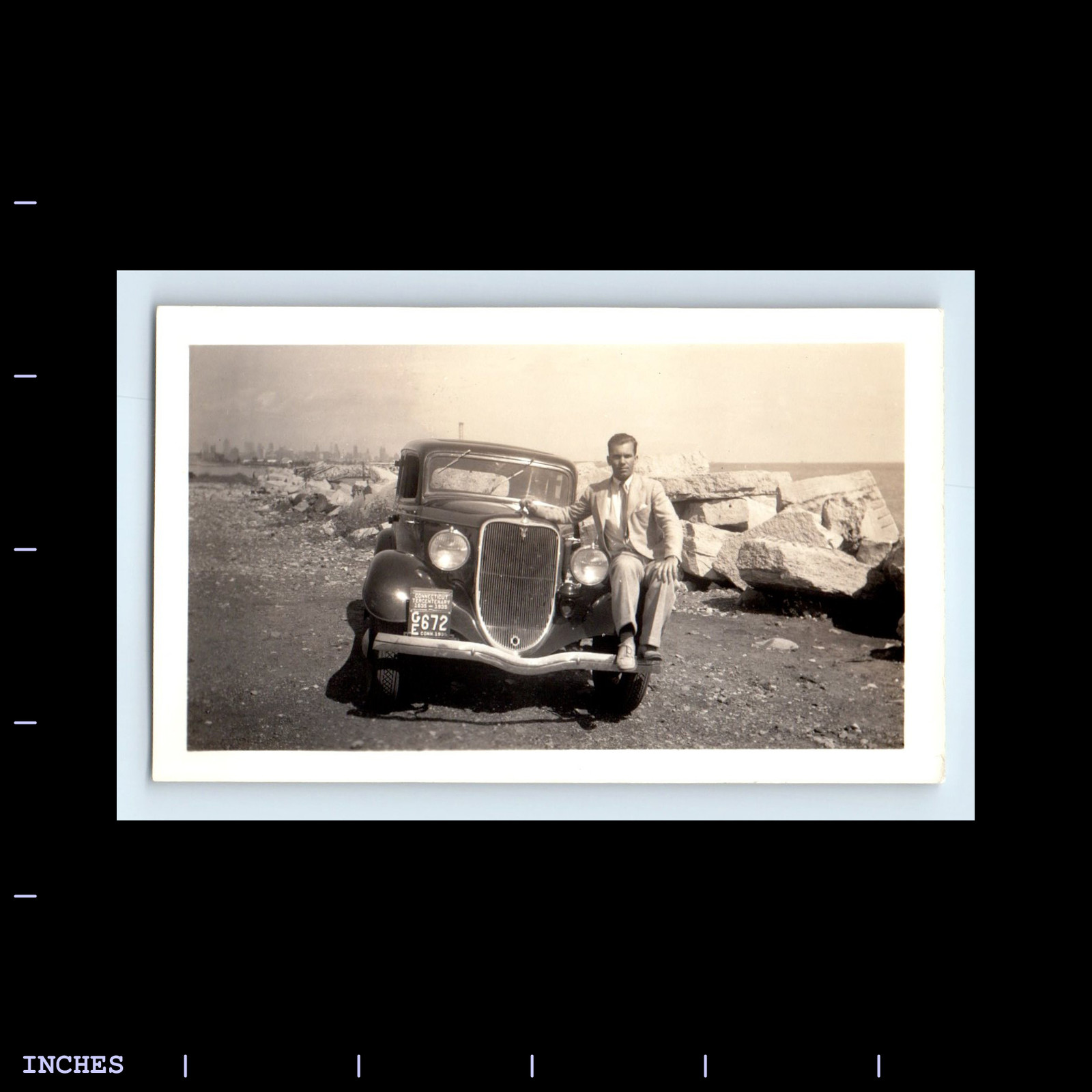 Vintage 1935 photo of a man by classic car at Chicago World's Fair