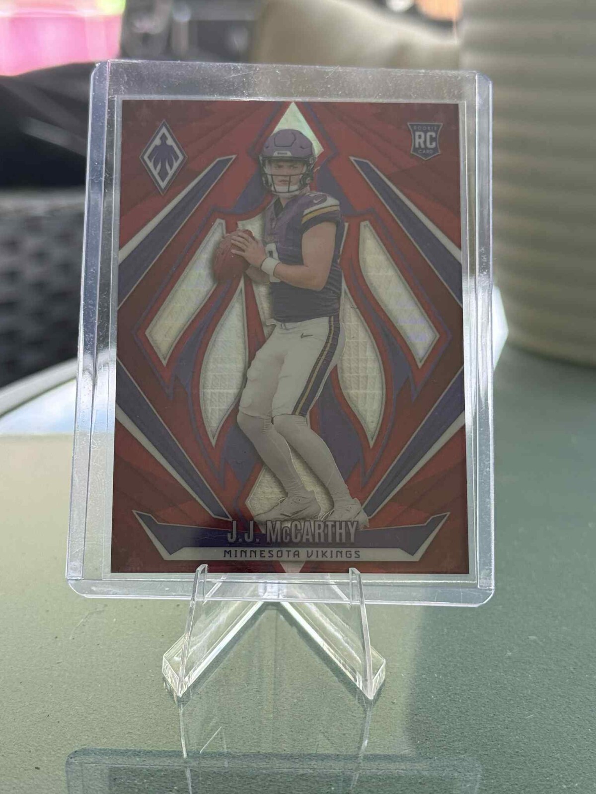 2024 Panini Phoenix - Rookies J.J. McCarthy #185 Red Hyper /140 (RC)