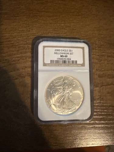 2000 $1 AMERICAN SILVER EAGLE NGC MS69 FROM THE MILLENNIUM SET BROWN LABEL