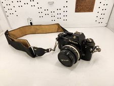 Nikon EM 35mm SLR Camera with 50mm1:1.8 Lens Untested