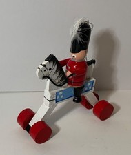 VTG Wood Christmas Ornament Soldier On Blue  White Horse With Red Wheels