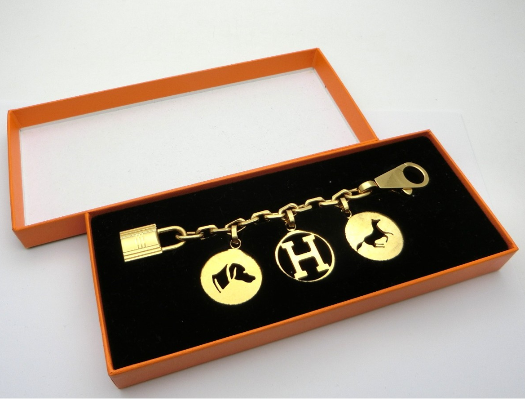 Hermes Breloque Gold Bag Charm Amulette 4 Rock dog hose H Cadena