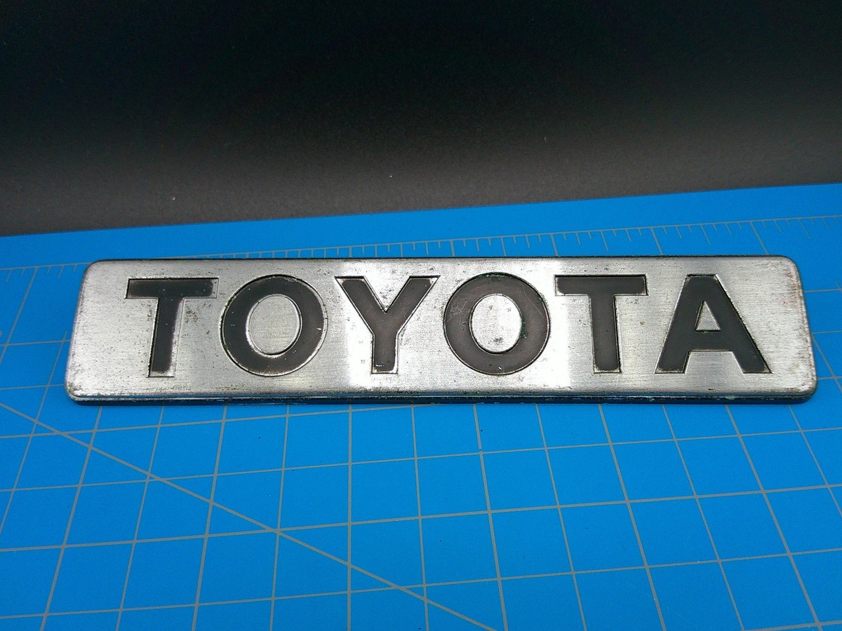 Vintage Toyota Metal Emblem Badge Script Logo 75442-16020 OEM