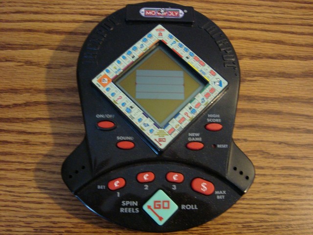 Monopoly Jackpot LCD Handheld Slot Machine Game Vintage 1999 Hasbro W 
