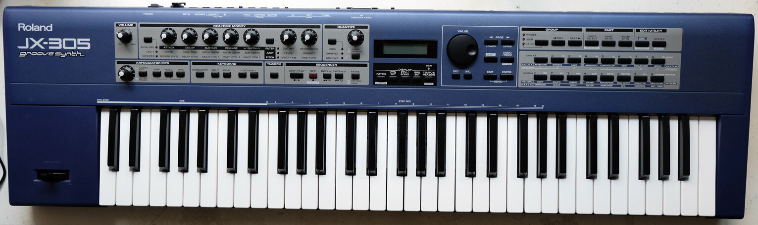 Roland JX-305 Groove Synth parfait état esthétique boîte à rythmes et manuel de l'utilisateur