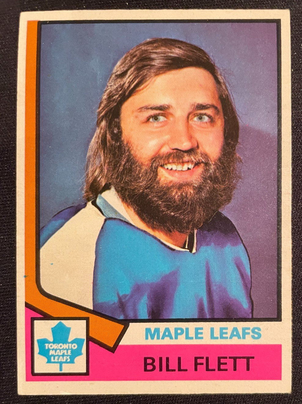 Bill Flett #64 Hockey Cards 1974 O-Pee-Chee trading card — raw and PSA graded price guide