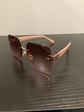 Miu Miu Pink Rimless Sunglasses Womens