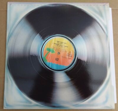 U2 - New Year's Day / Treasure / Fire / I Threw a Brick - 12'' Maxi Single Record