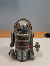 4" Rolling Robot-7 Litho Tin Toy Unbranded Accoutrements 1997 Taiwan