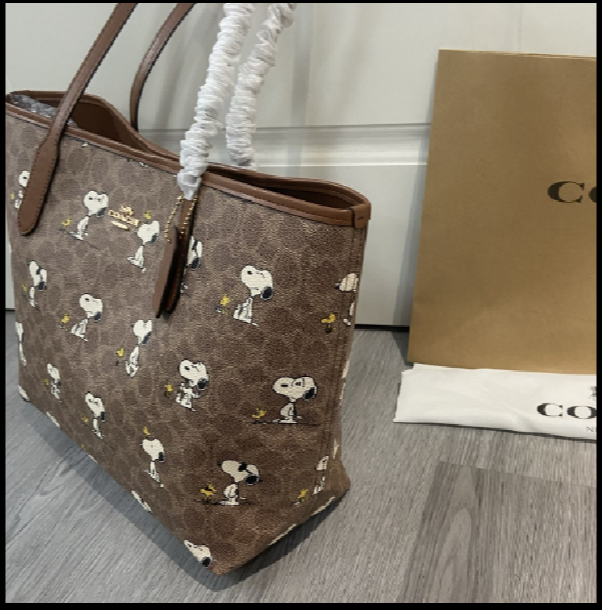 COACH CBJ89 City Tote Bag PEANUTS Snoopy Signature Coated Canvas