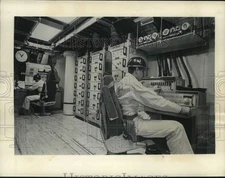 1963 Press Photo Pentagon's scientists working on improvements to weapons.