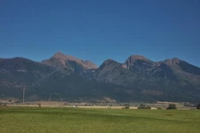 Valley view nearby Mission Mountains near little town St. Ignatius, population
