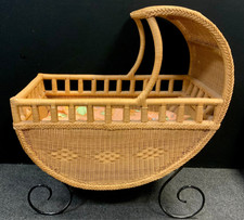 A large Lloyd Loom style wicker-work crib / cot, wrought iron base, 115cm high