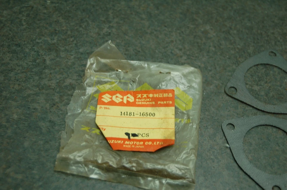 9 NOS JUNTA TUBO ESCAPE SUZUKI 14181-16500 (CANTIDAD-9) 1971-75 TM400 1972-77 TS400 Foto 2 de 3