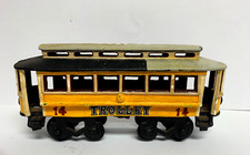 CAST IRON METAL TRAIN TROLLEY STREET CAR w/ HOOK YELLOW PAINTED METAL VINTAGE