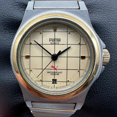 PUMA Quartz Vintage Armbanduhr 100M Japan Datum Zweifarbig Edelstahl