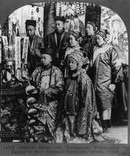Chinese bride & bridegroom worshipping the tablets of ancestors, Canton 1919