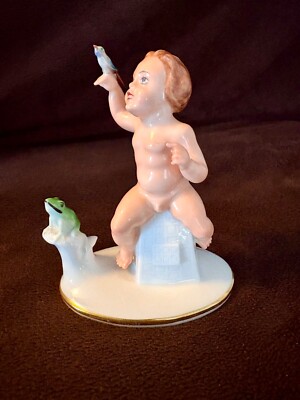 Rare Rosenthal Bavaria figurine. Cherub holding a bird with frog. E Holzer 524. 
