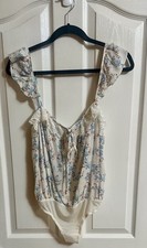 NWOT Intimately Free People Take It Away Floral Bodysuit. Size Small.