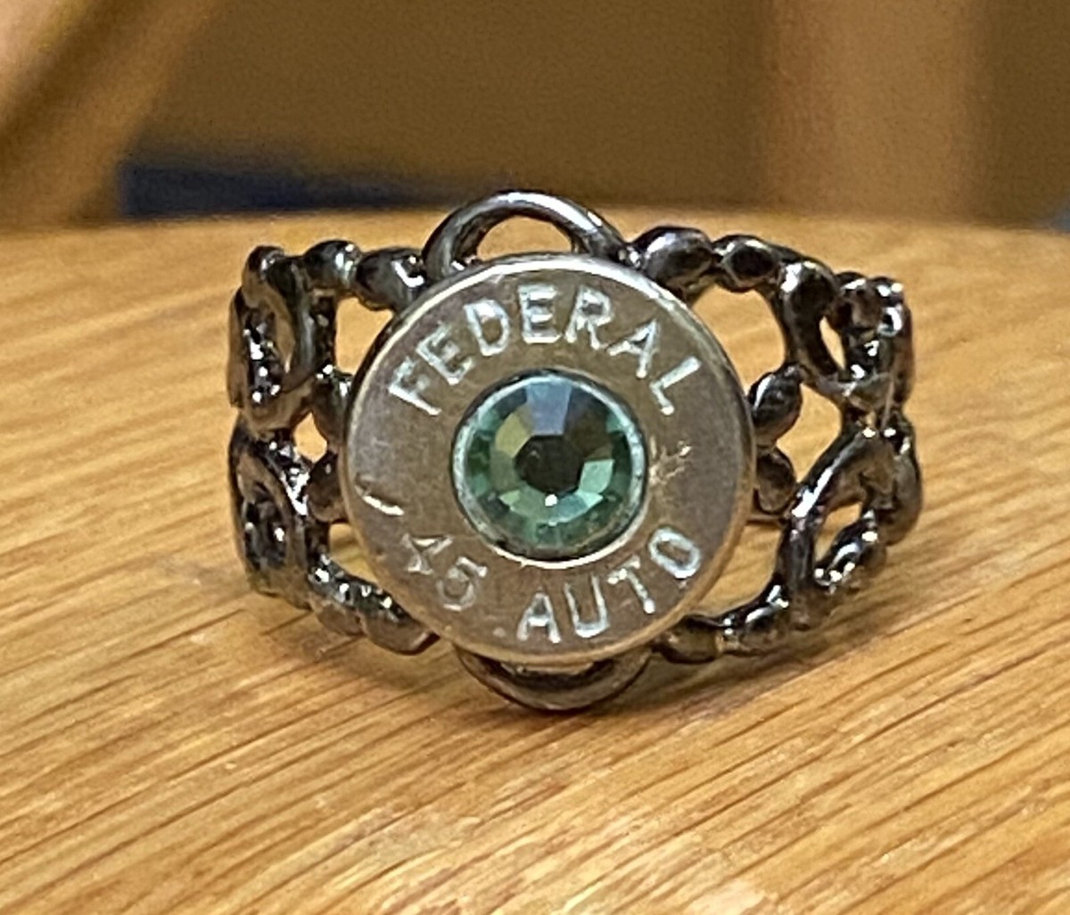 Federal 45 Caliber Nickel Bullet Casing Filigree Ring w/ Green Crystal