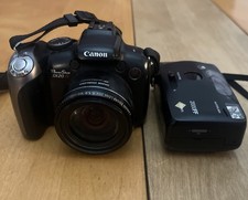 Canon PowerShot SX20 IS 12.1MP Digital Camera...