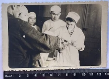 old photos of affectionate cute women/men, doctors bandage the patient's leg