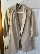 Woman  s Blazer Size Small . New Without Tag