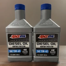 AMSOIL 100% Synthetic  Diesel Oil Heavy - Duty Protection SAE 15W-40