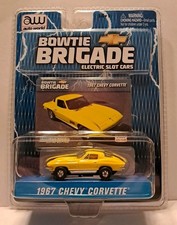 AUTO WORLD THUNDERJET 500. 1967 CHEVY CORVETTE 327. MINT ON CARD