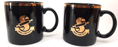 Set Of 2 Mrs. Smith's Bakery Black & Gold Logo Coffee Mugs In A Class By Itself