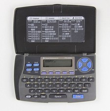 Texas Instruments PS-2400 PDA Personal Digital Assistant Calculator Databank