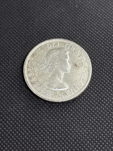 1960 CANADIAN SILVER DOLLAR ELIZABETH II  TONED