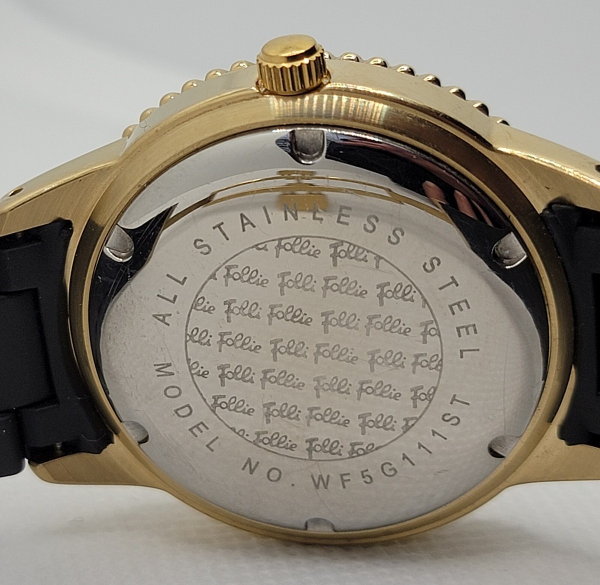 Ladies Folli Follie Paved Bezel Gold Tone Case White Dial 