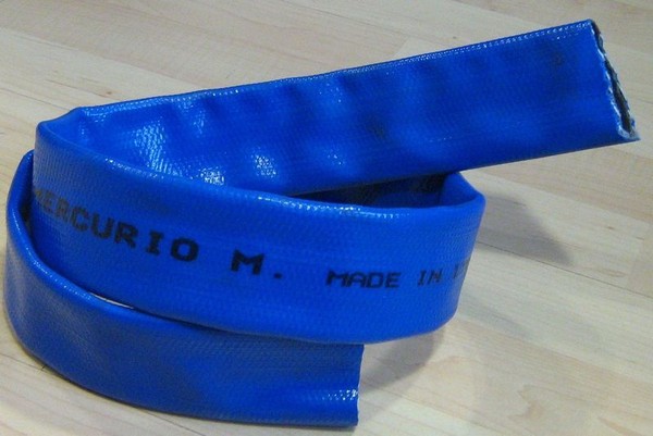 Manguera Plana Reforzada con Hilo de Poliester Ø 35 mm como funda alargos soldar