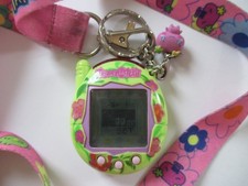 Tamagotchi Connection V3 2004 Green Pink Tropical Flowers Lanyard, Charm, Works