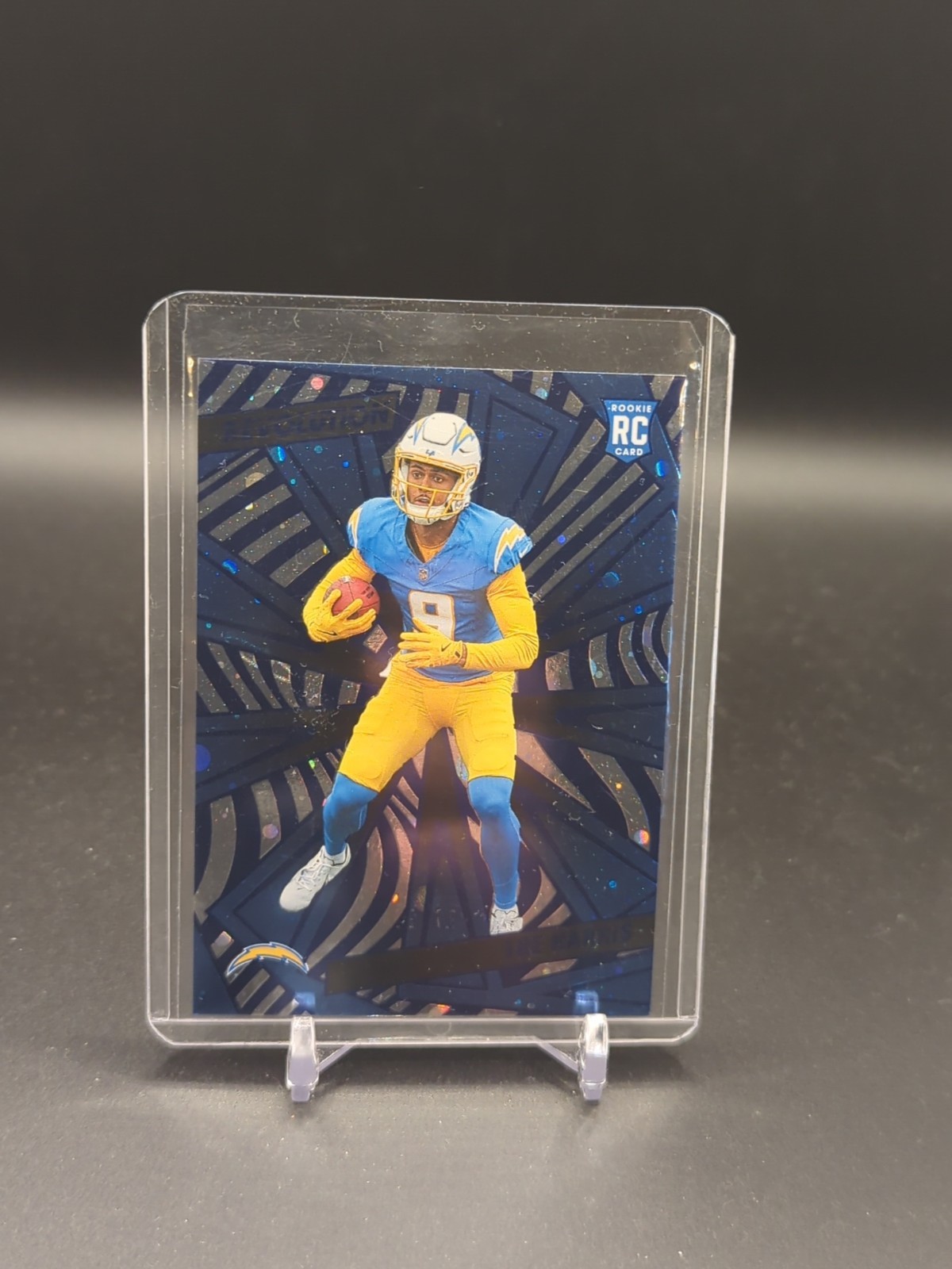 2025 Panini Revolution - Rookies Tre Harris #243 Blue Swirl /99 (RC)