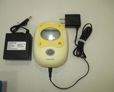 Medela Freestyle Portable Breast Pump with Charging Power Cord And Battery Pack