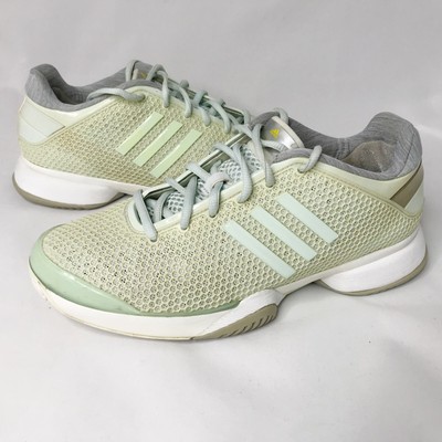 green and gold tennis shoes