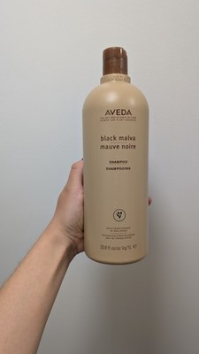 Aveda Black Malva color-depositing shampoo for dark shades