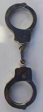 Paire de menottes anciennes hybride (C.O.CO. 169 / Peerless / Smith & Wesson)