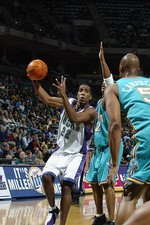 Michael Redd Milwaukee Bucks drives to the basket at the NBA game- 2002 Photo 2