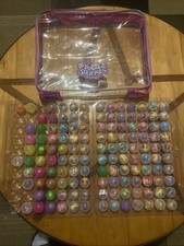Squinkies Lot with Over 100 Squinkies And Carry Case