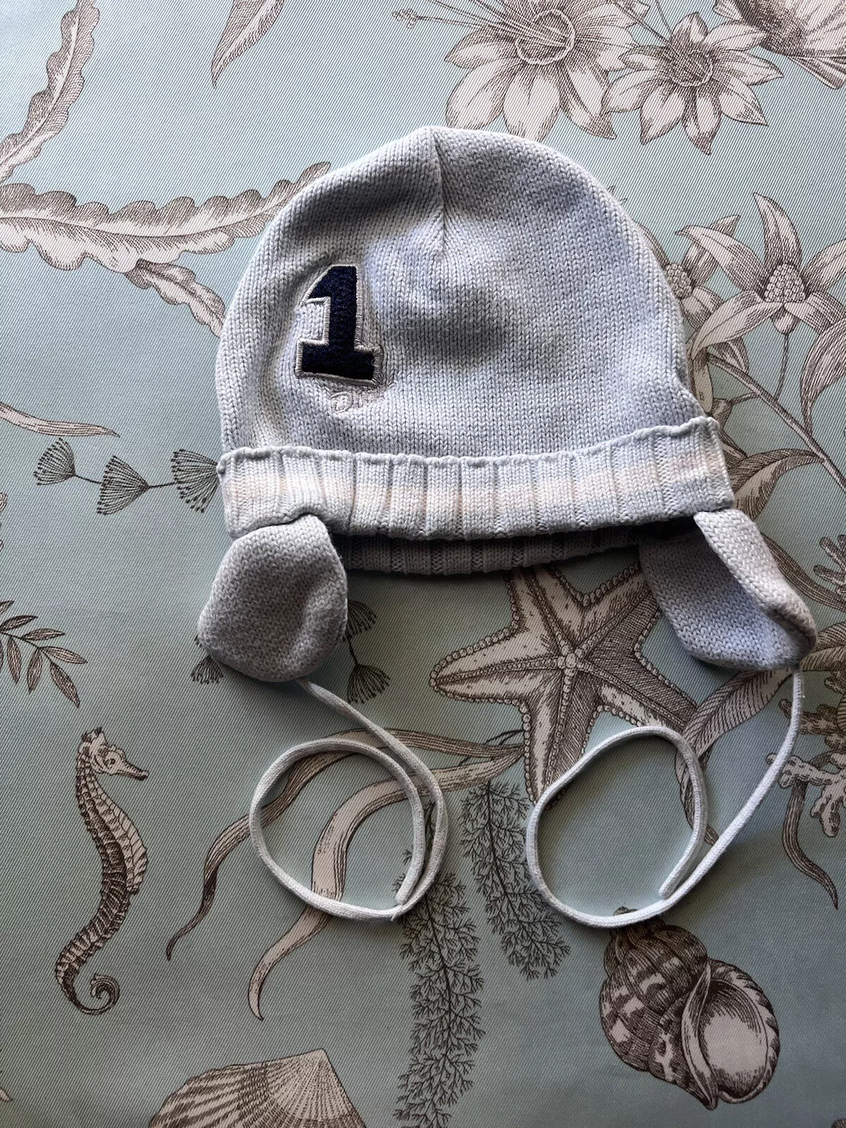 chapeau tricot bleu bébé DIOR numéro un taille 18M